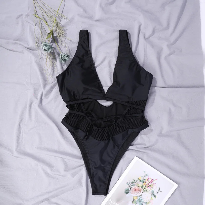 Euro-american swimsuit black mesh hollowed out lace-up one-piece swimsuit tight swimsuit bikini spot wholesale